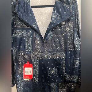 The North Face Blue and White Patterned Jacket